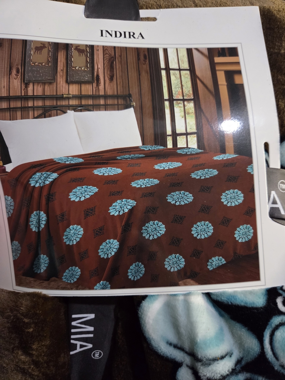 Brown Floral Pattern Bedspread with Turquoise Accents